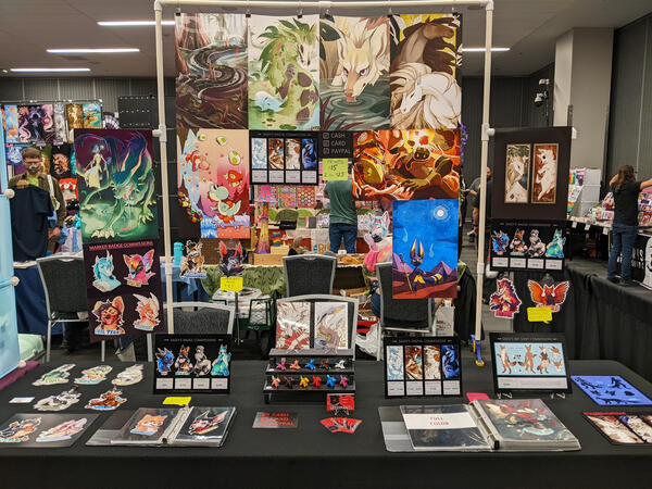 A photo of my convention table setup.